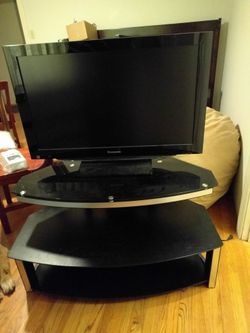 Glass TV stand (TV not included)