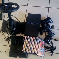 Playstation 2 lot of games Controllers power cord and steering wheel