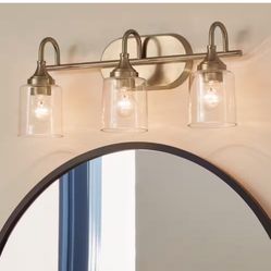 Erta 24 in. 3-Light Champagne Bronze Bathroom Vanity Light with Clear Glass Shades