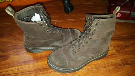 Used Brown sketcher boots size 8
