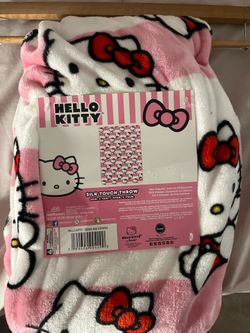 Pinks and white Hello Kitty throw blanket