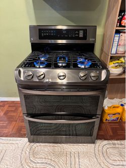 Estufa LG Black Stainless Steel Doble Horno 5 Quemadores