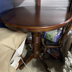 Counter Height Table/ Four Chairs $450