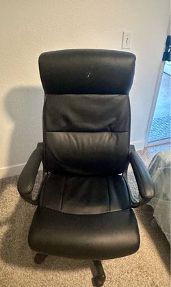 Black faux leather executive office chair