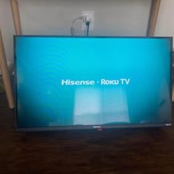 32’ Flat Screen Roku TV + mount