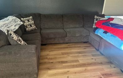 Sectional couch with ottoman