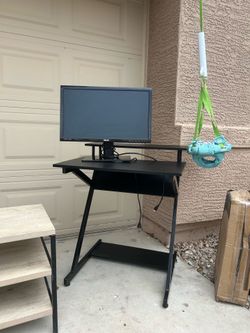 Black desk and monitor $25