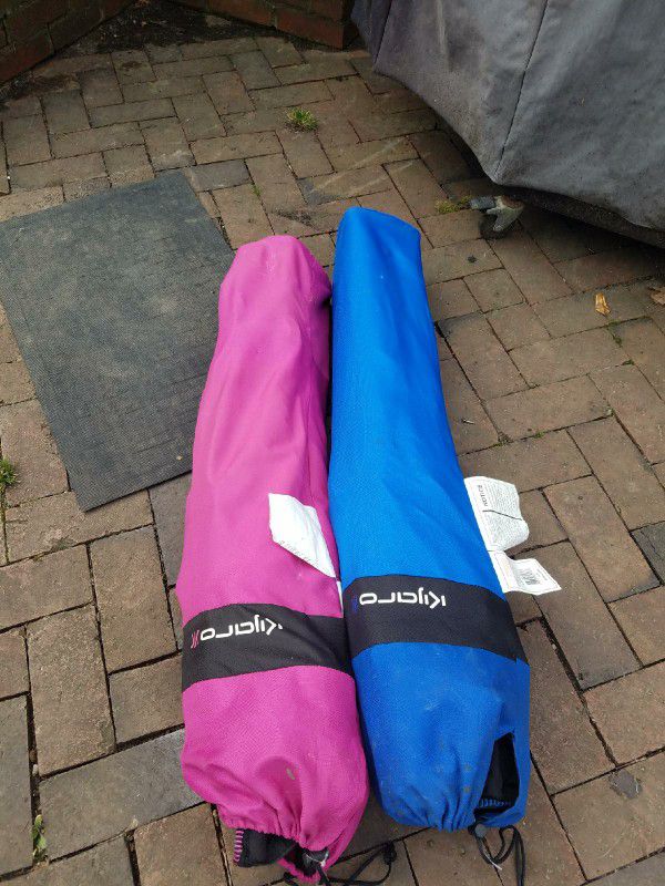 Two folding camping chairs
