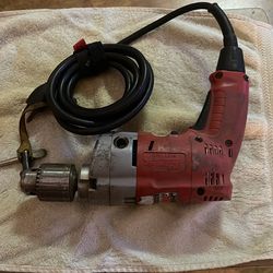 Milwaukee 1/2” hole shooter with chuck key