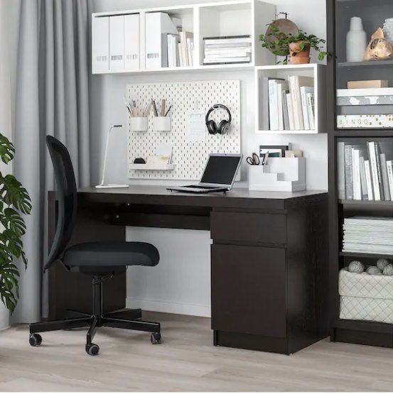 Black desk with drawer and cabinet - new condition from Ikea