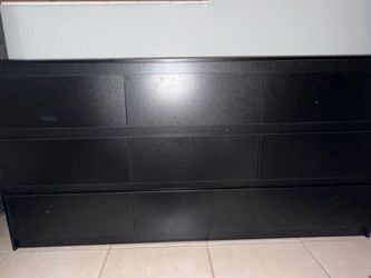 Black dresser with nine drawers