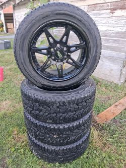 275/55R20/111T Tires and  Rims
