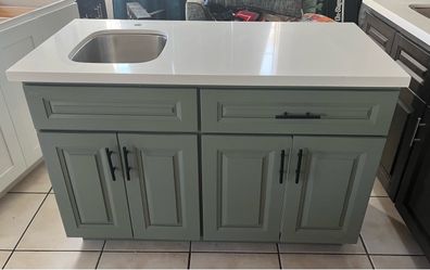 Kitchenette with countertop and sink