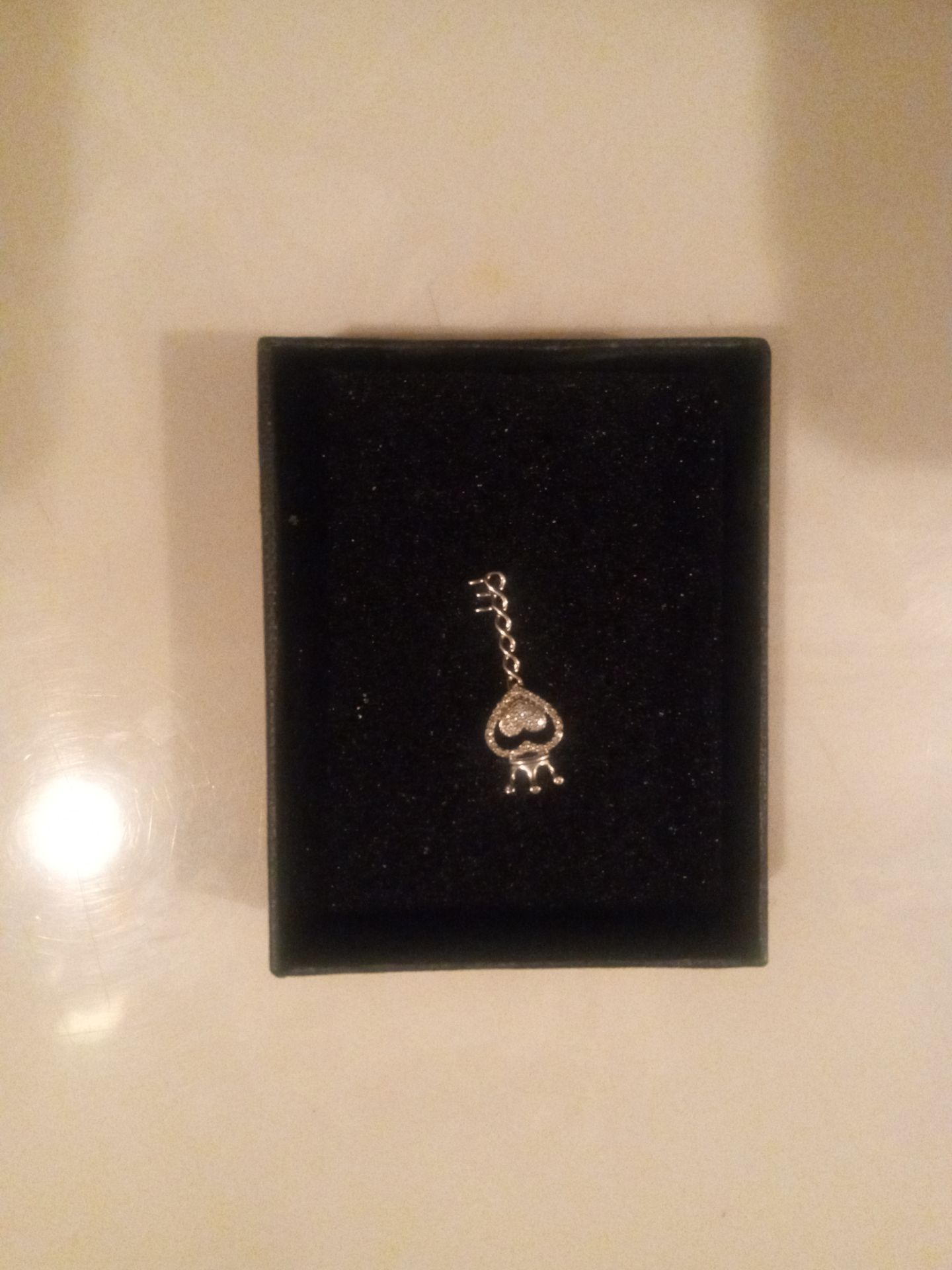 Diamond encrusted key heart charm