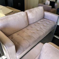 Pink Tufted Couch And Two Chairs