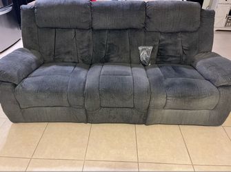 Power reclining sofa