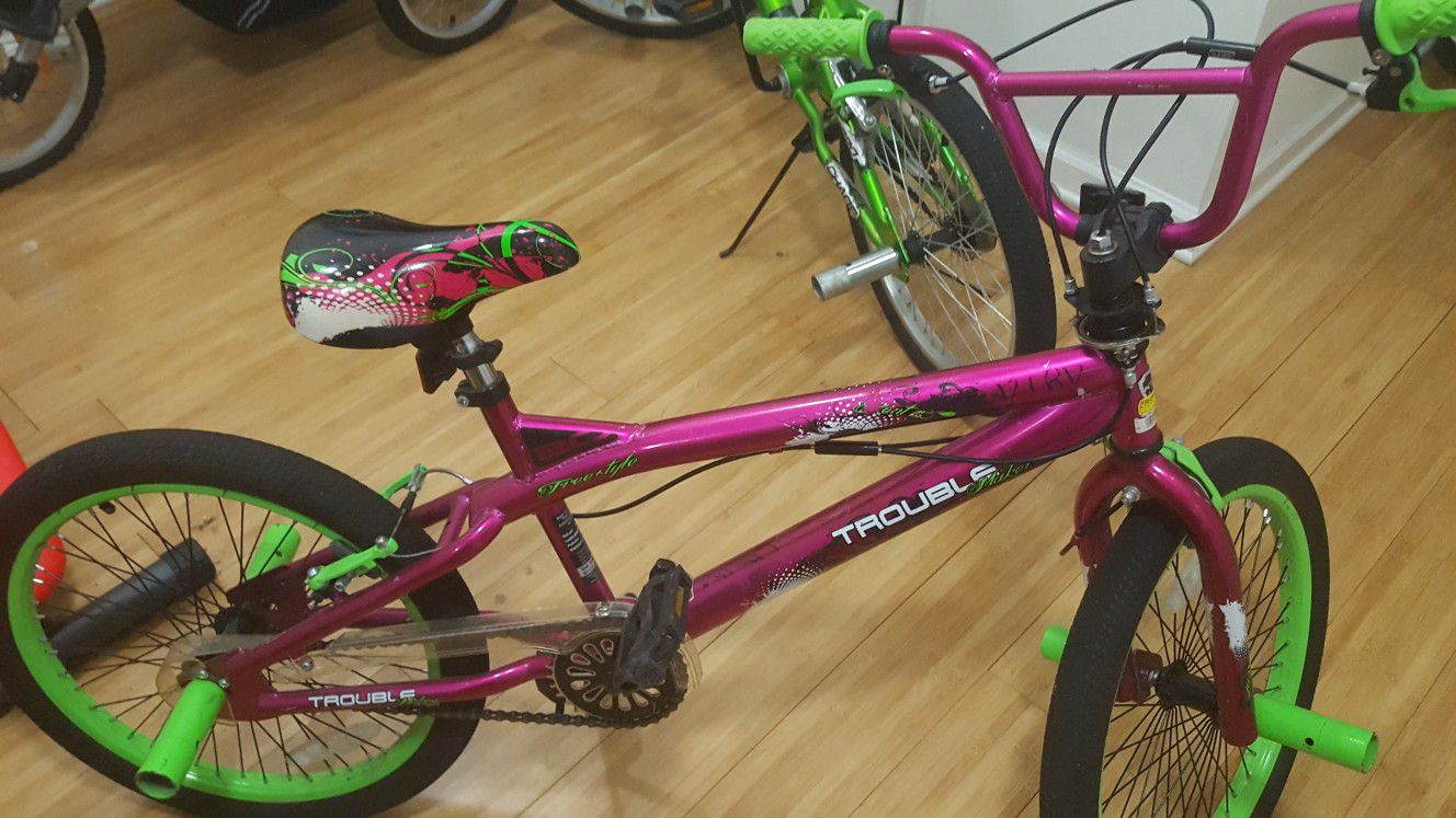 A Girls bikes with Pegs