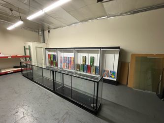 Tall Glass Retail Display Cabinets with Lights & Locks – $200 Each