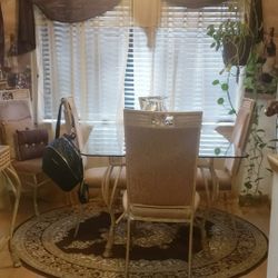 Gold Dinette set 4 Chairs , Glass Table With Backer Rack $450 obo