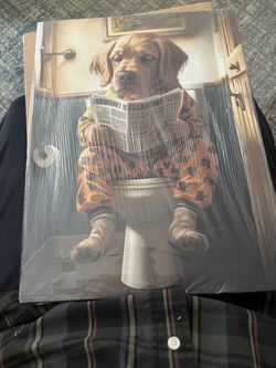 Canvas pic of dog reading newspaper on toilet 