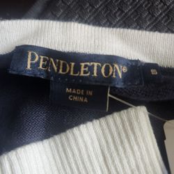 Pendlet.\nOn women's sweater small