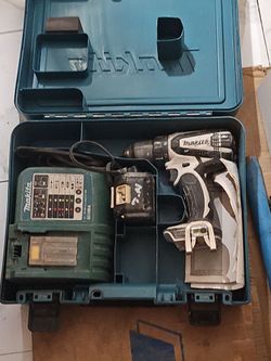 Makita drill  with 5.0 AH BATTERY USE IN GOOD WORKING CONDITION