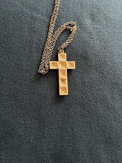 It’s A Beautiful cross with long chain it’s custom jewelry