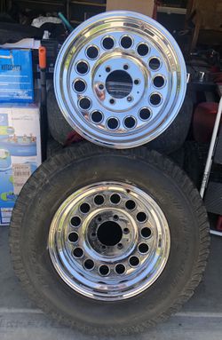 4 Tires and rims and brand new rim OBO