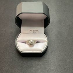 Woman’s Diamond Ring And Wedding Band