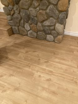 Hardwood.  Ceramic. Glue down. 