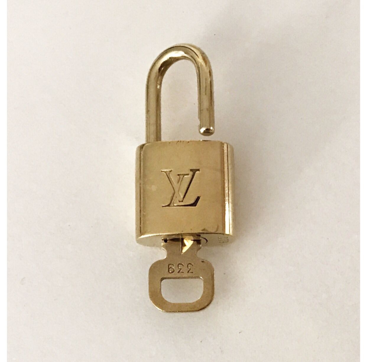 Gold Louis Vuitton Lock & Key Set #308 for Sale in Roma, TX - OfferUp