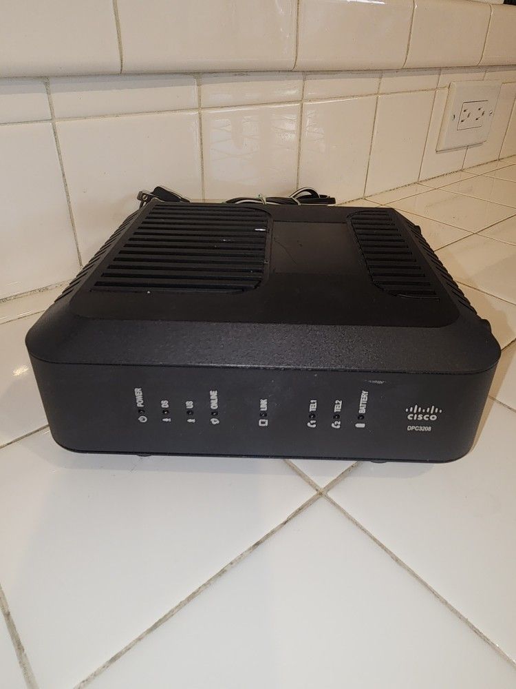 Cable Modem with Embedded Digital Voice Adapter.
Cisco DPC3208C DOCSIS 3.0 
8x4 