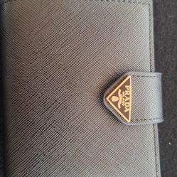 PRADA Bifold Wallet New In Box retails $725.00