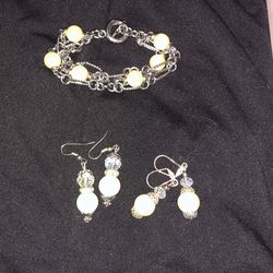 Two Pearl Earrings, And Bracelet and A Pearl Necklace