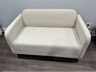 Small white love seat