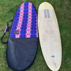 Surfboard with board bag