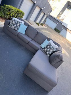 Absolutely perfect gray Ashley’s sectional couch !!