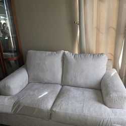 Beige Loveseat And Oversized Armchair