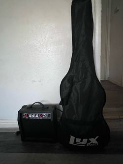 Guitar Gig Bag and Small Practice Amp