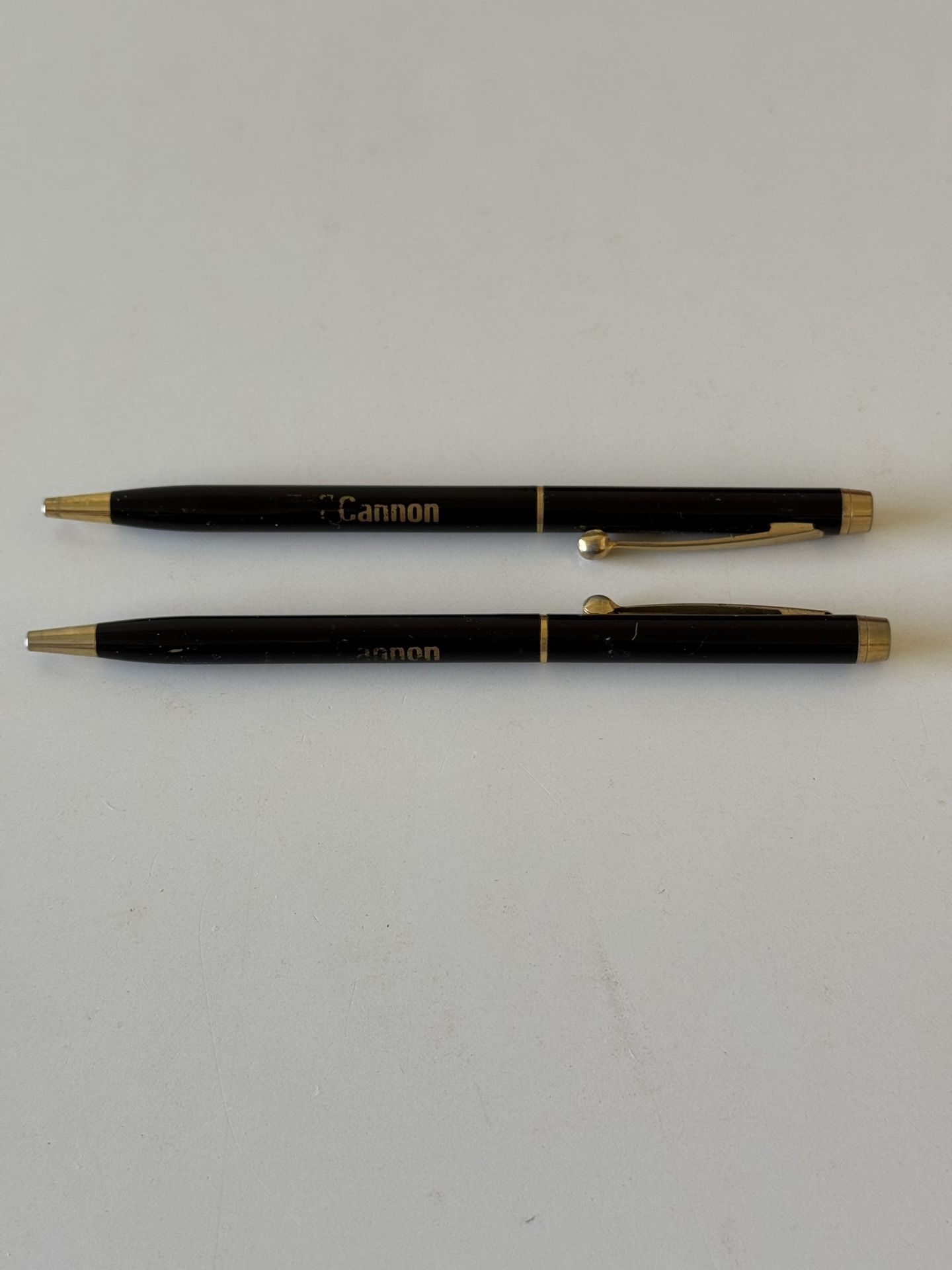Set Of Two Gold Cannon Pens One Blue And One Black