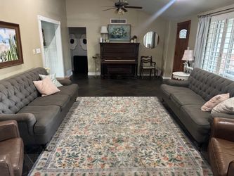 Set of matching Victorian gray tufted couches