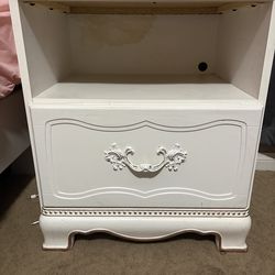 White, full size bed frame dresser and nightstand.