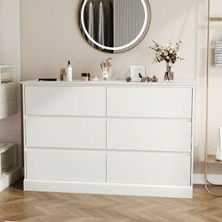 This 6-drawer dresser measures 47.2" (W) x 15.8" (D) x 30" (H),