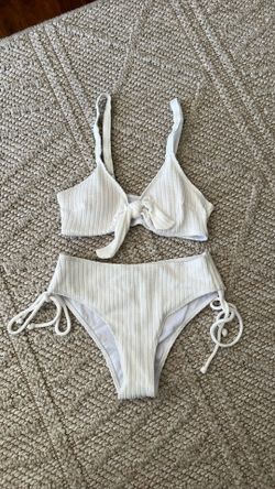 White swimsuit with high waisted bottoms