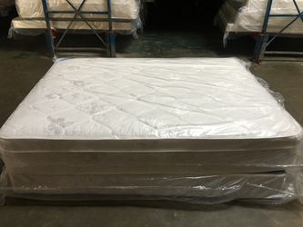 Brand new firm orthopedic queen pillow top mattress and box spring.