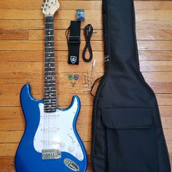 Metallic Blue Electric Guitar And Bag And Accessories