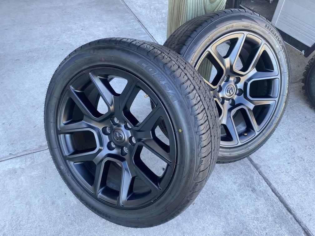 SET OF 2 ONLY RIMS N TIRES