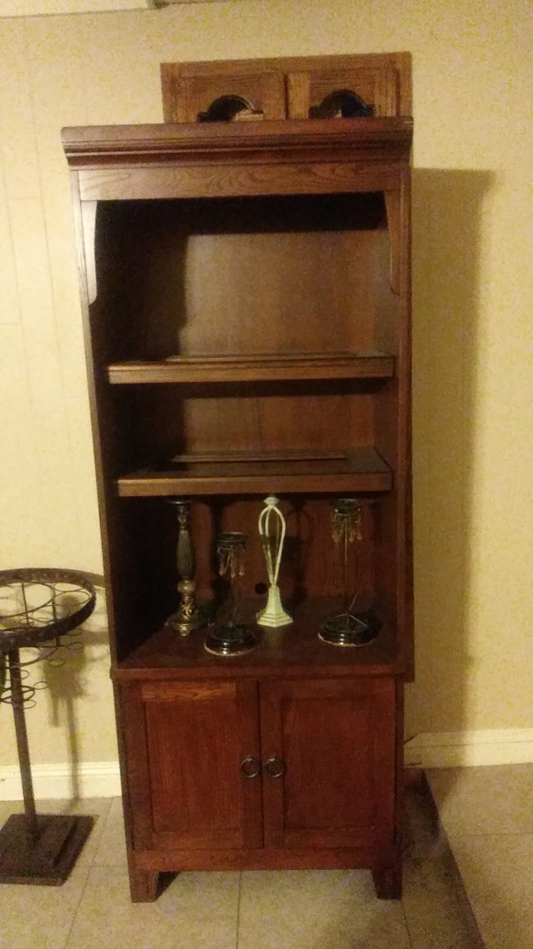 2 stained wooden bookshelves