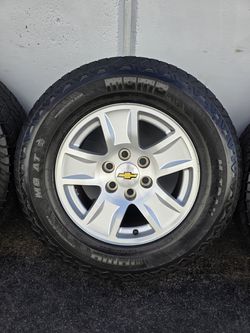 17" Chevy Silverado OEM rims 265-65R17 tires
