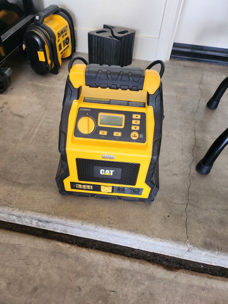 Cat jump start and compressor.
